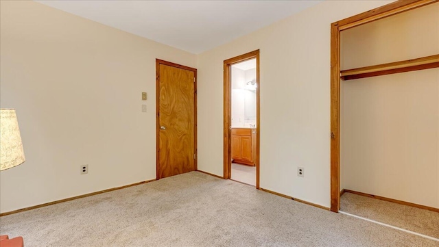 5913 NE Decker Rd NE, Bushkill, PA 18324 - unfurnished bedroom featuring light carpet, a closet, and ensuite bathroom