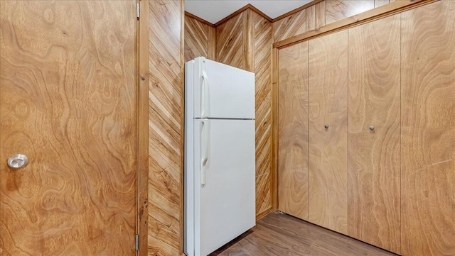 5913 NE Decker Rd NE, Bushkill, PA 18324 - kitchen featuring freestanding refrigerator, wood walls, and wood finished floors