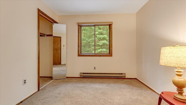 5913 NE Decker Rd NE, Bushkill, PA 18324 - unfurnished bedroom featuring baseboard heating and carpet floors