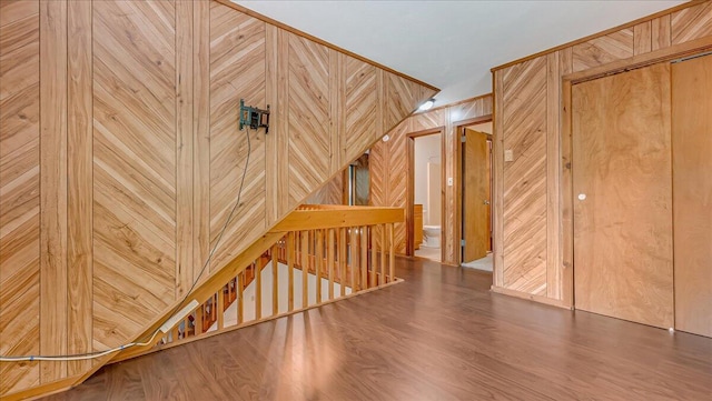 5913 NE Decker Rd NE, Bushkill, PA 18324 - corridor with an upstairs landing, wood finished floors, and wooden walls