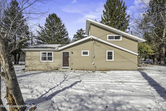 view of snow covered house