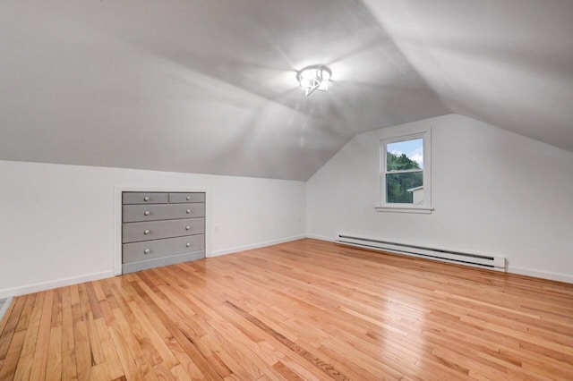 7 Brook Ln, Spring Brook Township, PA 18444 - bonus room with a baseboard heating unit, light wood-type flooring, lofted ceiling, and baseboards