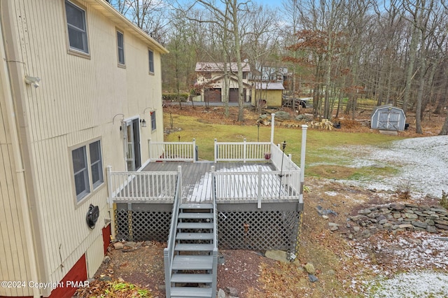 deck featuring a lawn