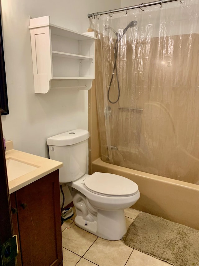 full bath featuring toilet, tile patterned flooring, shower / bath combo, and vanity