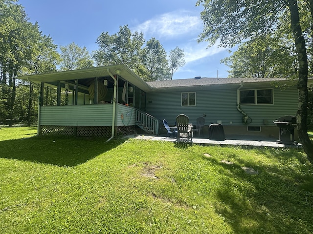 5238 Mountain View Dr, Stroudsburg, PA 18360 - rear view of house featuring a lawn and a patio area