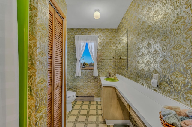 bathroom featuring wallpapered walls, a closet, tile patterned floors, toilet, and baseboard heating