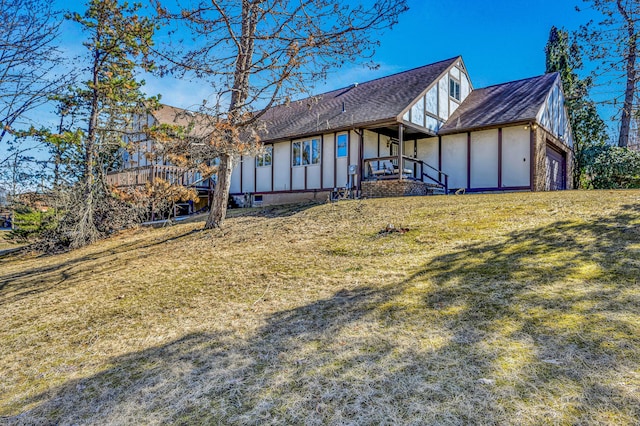 view of front facade featuring a front yard and a garage