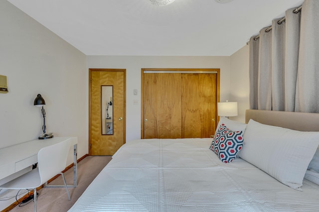 carpeted bedroom with a closet