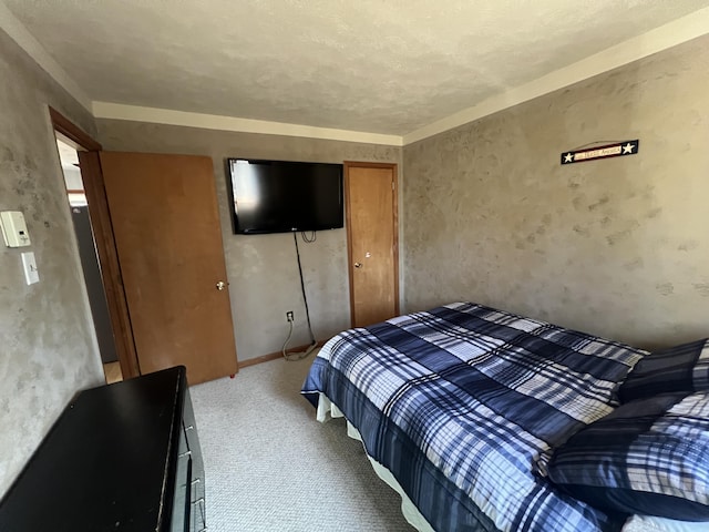 bedroom with a closet and carpet flooring