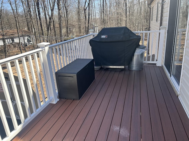 wooden terrace with area for grilling