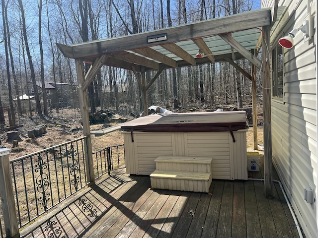 deck featuring a hot tub