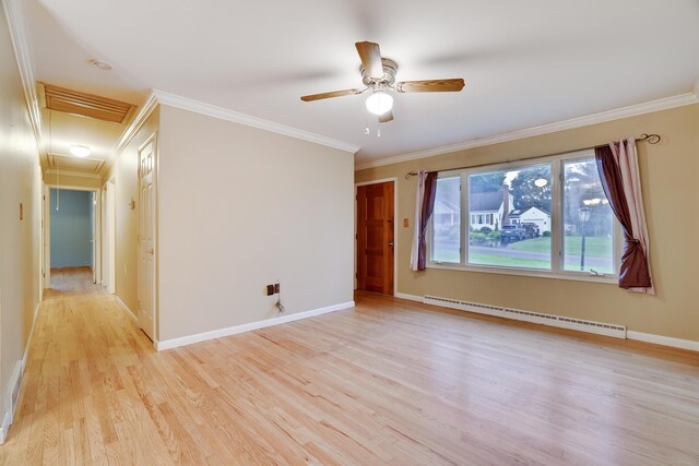 1703 Wallace St, Stroudsburg, PA 18360 - spare room featuring attic access, a baseboard radiator, light wood finished floors, ornamental molding, and ceiling fan