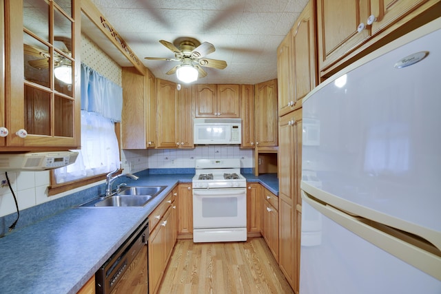 1703 Wallace St, Stroudsburg, PA 18360 - kitchen featuring white appliances, light wood finished floors, decorative backsplash, ceiling fan, and dark countertops