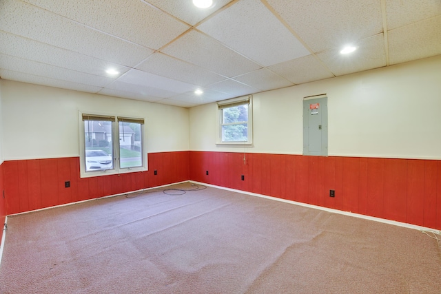 1703 Wallace St, Stroudsburg, PA 18360 - carpeted spare room with a wainscoted wall, electric panel, a paneled ceiling, wooden walls, and recessed lighting