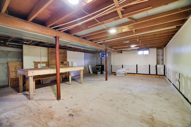 1703 Wallace St, Stroudsburg, PA 18360 - basement featuring a wood stove