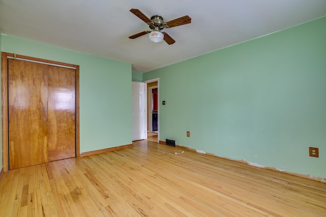 1703 Wallace St, Stroudsburg, PA 18360 - unfurnished bedroom with wood finished floors, a closet, and ceiling fan