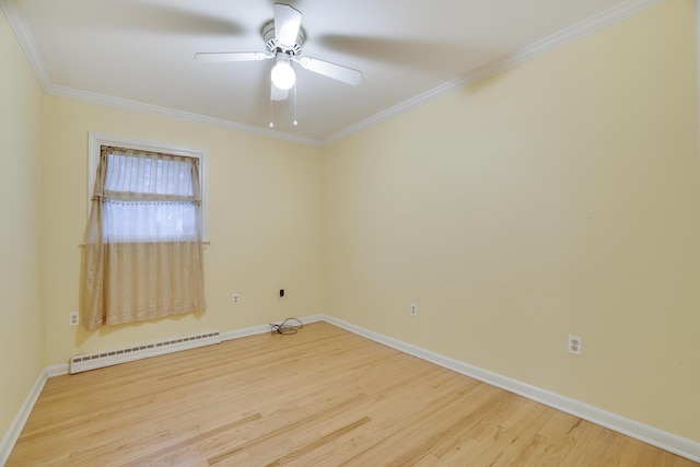 1703 Wallace St, Stroudsburg, PA 18360 - unfurnished room featuring baseboard heating, wood finished floors, a ceiling fan, and crown molding