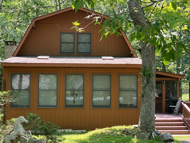 6118 Decker Rd, Bushkill, PA 18324 - view of side of property with a wooden deck and a chimney