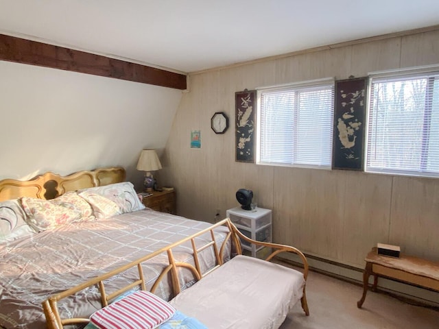 sitting room with beam ceiling, carpet, and wood ceiling