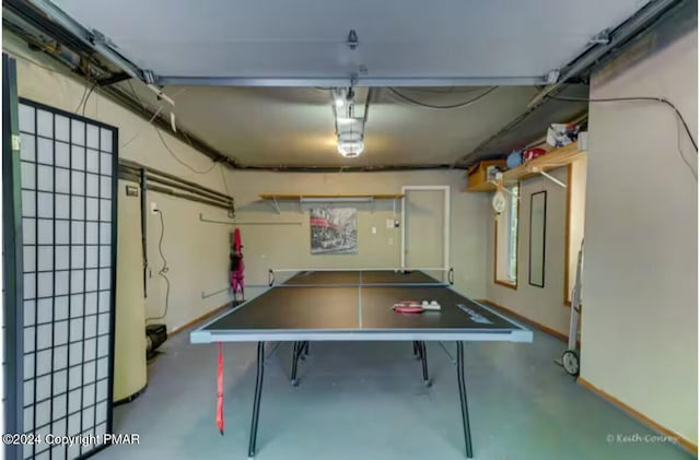 playroom featuring a garage and concrete flooring