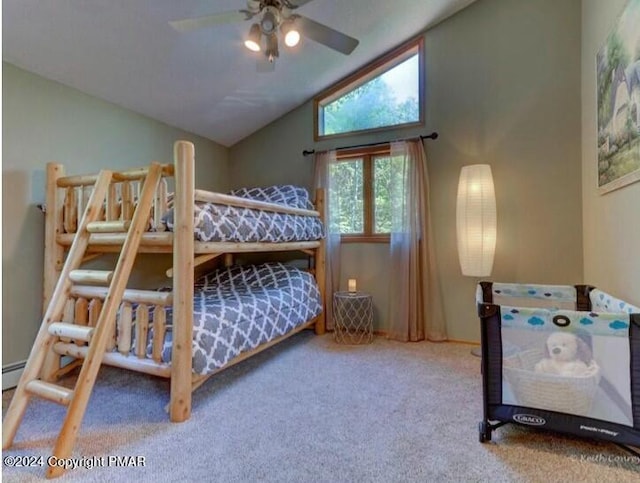 carpeted bedroom featuring vaulted ceiling