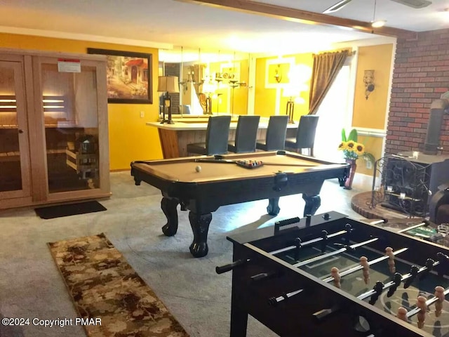 rec room featuring a wood stove, billiards, and carpet floors