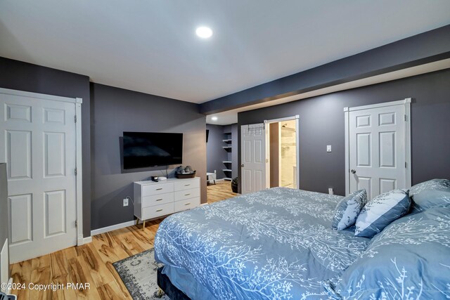 bedroom featuring hardwood / wood-style floors