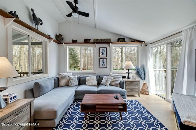 sunroom / solarium featuring vaulted ceiling and ceiling fan