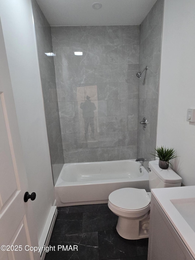 full bathroom featuring a baseboard heating unit,  shower combination, toilet, and vanity