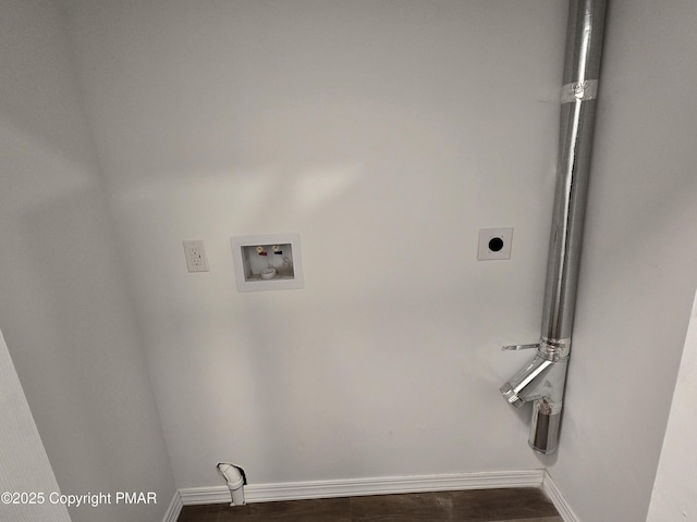 laundry area featuring hookup for a washing machine, baseboards, laundry area, and electric dryer hookup