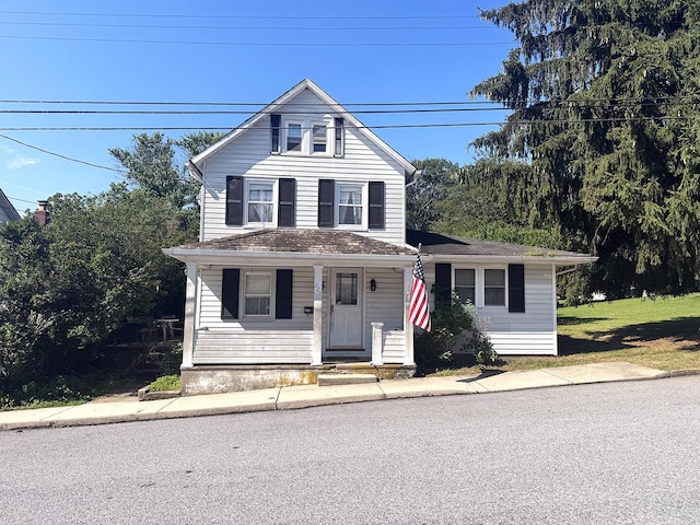 221 Diamond St, Pen Argyl, PA 18072 - view of front of house with covered porch and roof with shingles