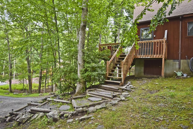 118 Sussex Ct, Bushkill, PA 18324 - view of yard with stairs and a wooden deck