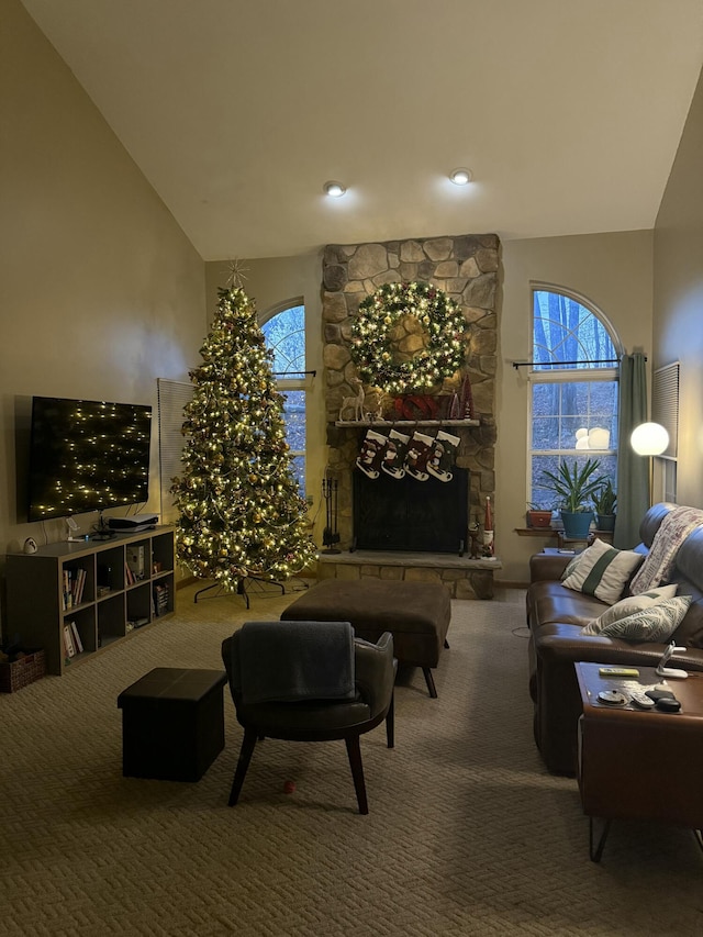 136 Outlook Ct, East Stroudsburg, PA 18302 - carpeted living room with high vaulted ceiling and a fireplace