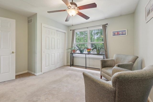 136 Outlook Ct, East Stroudsburg, PA 18302 - living area with light colored carpet and ceiling fan
