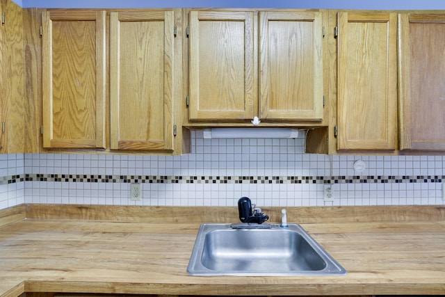 3055 Briarwood Dr, Tobyhanna, PA 18466 - kitchen featuring wood counters, light brown cabinetry, and backsplash