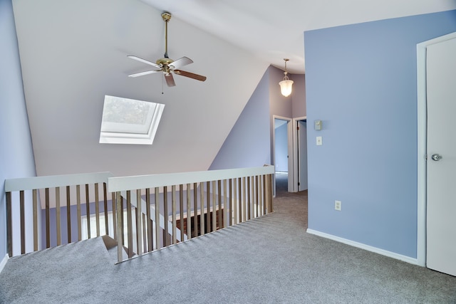 3055 Briarwood Dr, Tobyhanna, PA 18466 - hallway with a skylight, carpet flooring, and lofted ceiling
