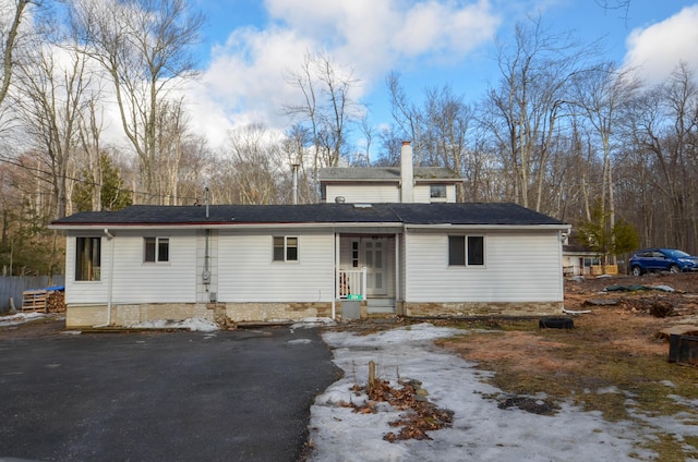 view of front of home with a chimney