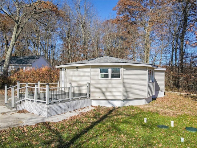 202 Palomino Pl, Tobyhanna, PA 18466 - view of property exterior featuring a wooden deck and a yard