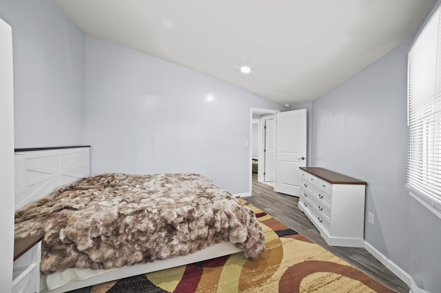 202 Palomino Pl, Tobyhanna, PA 18466 - bedroom featuring lofted ceiling, dark wood-type flooring, and baseboards