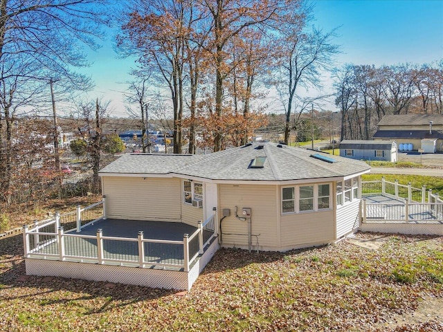 202 Palomino Pl, Tobyhanna, PA 18466 - back of house with a deck and roof with shingles