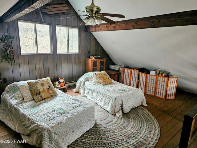 1123 Porter Dr, Bushkill, PA 18324 - bedroom featuring hardwood / wood-style floors, vaulted ceiling, wood walls, a baseboard radiator, and ceiling fan