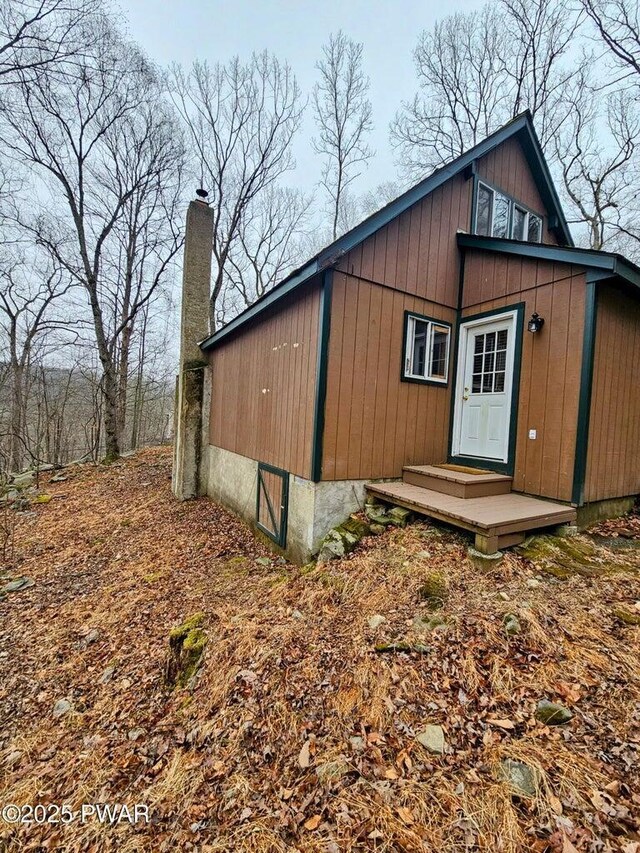 1123 Porter Dr, Bushkill, PA 18324 - view of side of property featuring a chimney