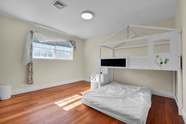 264 Maloney Ln, Tannersville, PA 18372 - bedroom with baseboards, visible vents, and wood finished floors