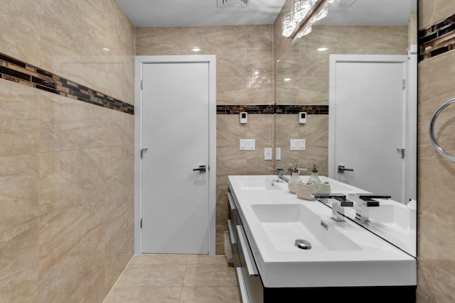 264 Maloney Ln, Tannersville, PA 18372 - full bath featuring double vanity, a sink, tile walls, and visible vents