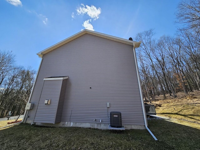 view of property exterior featuring a yard