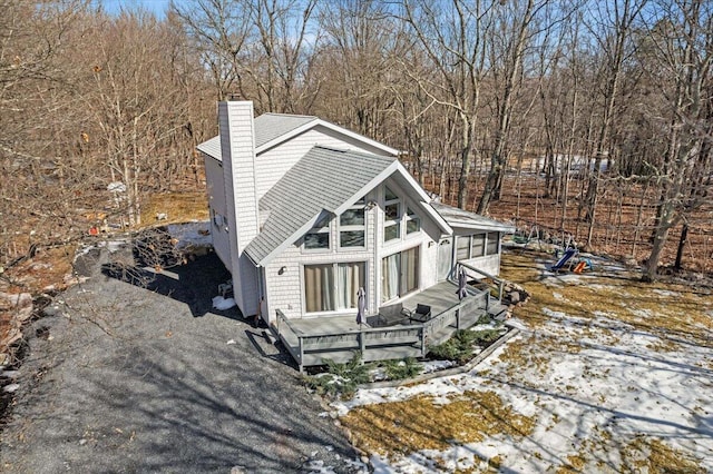 view of front of house featuring a chimney