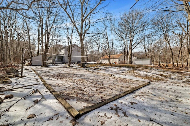 view of yard featuring volleyball court