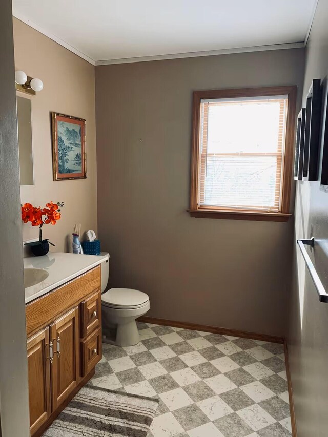 251 Dorchester Dr, Bushkill, PA 18324 - bathroom with vanity, tile patterned floors, and ornamental molding