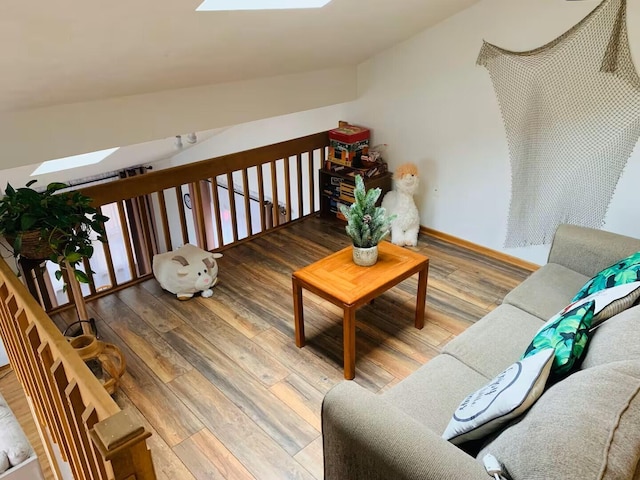 251 Dorchester Dr, Bushkill, PA 18324 - living area with hardwood / wood-style floors and a skylight
