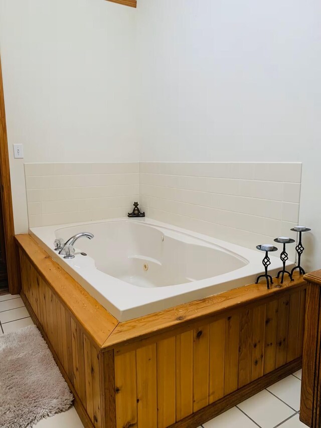 251 Dorchester Dr, Bushkill, PA 18324 - bathroom with a tub with jets and tile patterned floors